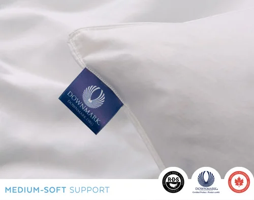 Close-up of the DOWNMARK® Certification tag on the edge of our Luxurious Down Pillow.