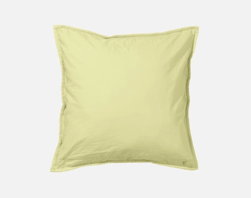 L'envers de notre housse de coussin carrée en lin et coton, de couleur verte, montre son envers en coton solide.