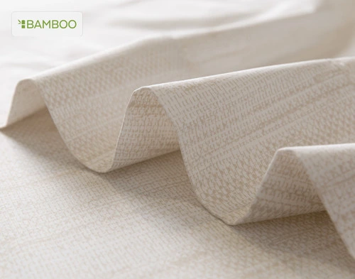 drap plat pour notre Bamboo Cotton drap  ensemble  en Crosshatch légèrement ébouriffé sur une surface lisse assortie.