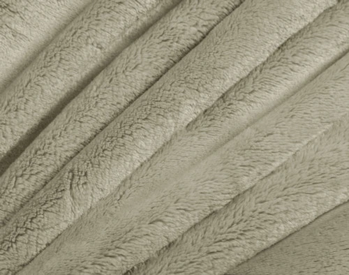 Gros plan sur le tissu de notre couverture Cashmere Touch polaire dans le coloris Mushroom.