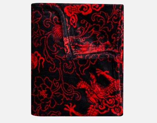 Our Lucky Dragon Throw in Red Luck folded into a tidy square.