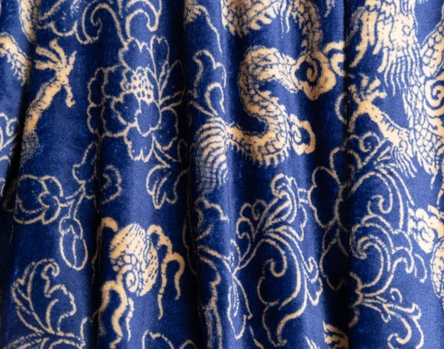 Close-up on the traditional Chinese dragon design on our Lucky Dragon Throw in Gold Fortune.