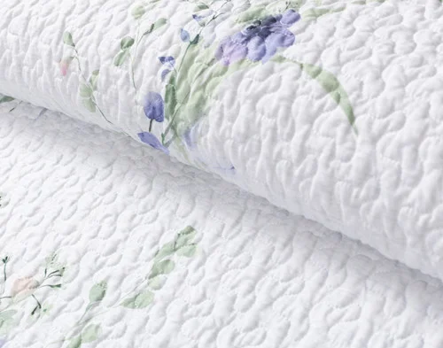 Close-up view of the simply soft surface on our Evelyn Coverlet Set.