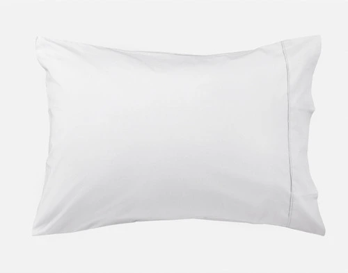 Front view of our White Organic Cotton Percale Pillowcase sitting on a solid white background.