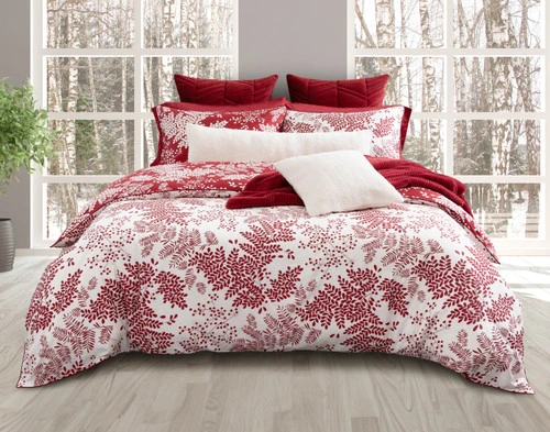 Front view of our Hayberry Duvet Cover over a plain queen bed, showcasing its red foliage design over a solid white background.