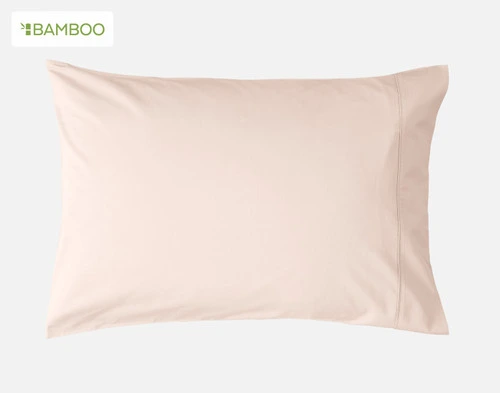 Front view of one of our Bamboo Cotton Pillowcase in Rosemist sitting against a solid white background.