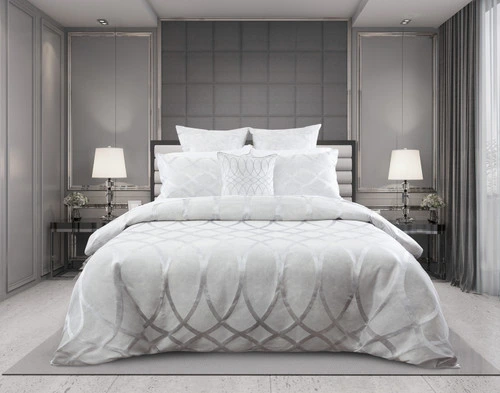 Front view of our Metropolitan Duvet Cover dressed over a queen bed in an elegant grey bedroom.