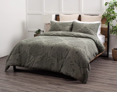 Front view of our Raintree Duvet Cover Set dressed neatly over a queen bed without additional layers or accessories.