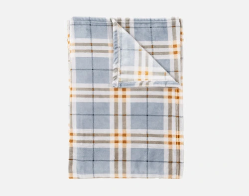 Our Forbes Plaid Throw folded into a tidy square on a solid white ground.