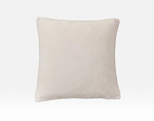 Front view of the smooth velvet backing on our Ripple Boucle Square Cushion in Cream on a white background.