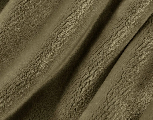 Close-up on our Velveteen Throw in Fir to show its soft plush texture.