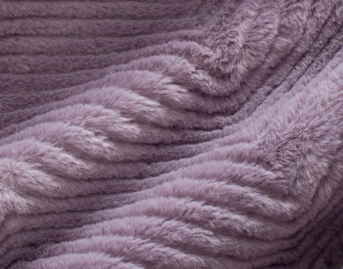 Close-up of the chevron texture and faux fur surface on our Purple Sage Chevron Etch Throw.