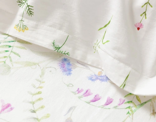 Close up of the Lena Duvet Cover design and its reverse, showcasing the textural difference between the two.