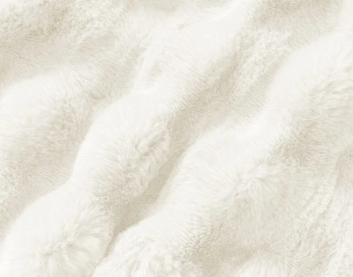 Close-up on the textural surface on our Bubble Faux Fur Throw in White.