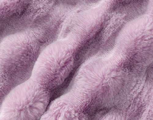 Close-up on the textural surface on our Purple Bubble Faux Fur Throw.