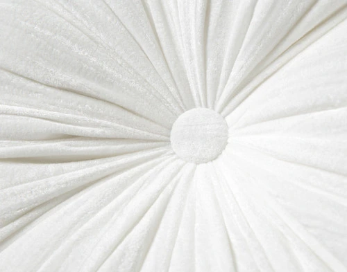 Close-up on the velvet surface and centered button detail on the center of our White Pleated Velvet Round Cushion.