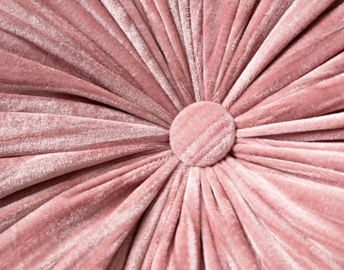 Close-up on the velvet surface and centered button detail on the center of our Flamingo Pleated Velvet Round Cushion.