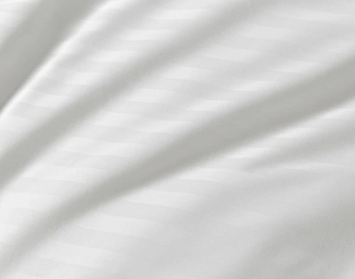 Close-up of the subtle striped surface on our Striped White Cotton Percale Blend Sheet Set.