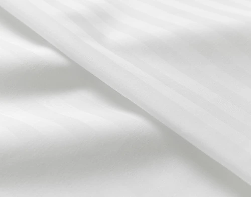 Close-up on a folded edge of our Striped White Cotton Percale Blend Sheet Set.