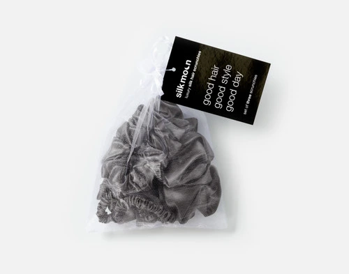 Top view of the mesh bag packaging holding our Pewter Mulberry Silk Scrunchie Set.