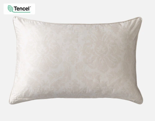 The reverse side of our Positano Floral Pillow Sham with a sandstone damask print.