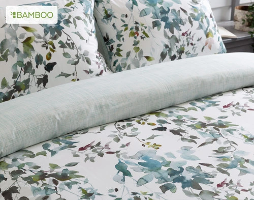 The Seabreeze collection dressing the head of a queen bed, with a closer view of the pillow shams and duvet cover.