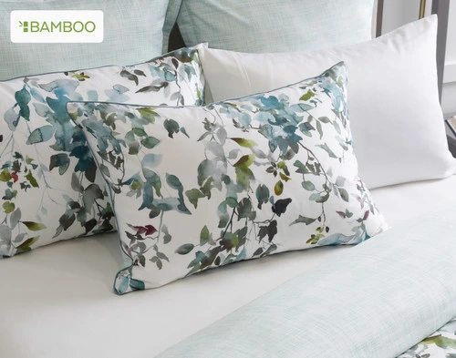 The Seabreeze Pillow Shams dressing the head of a bed along with the Seabreeze Euro Shams and a white pillow.