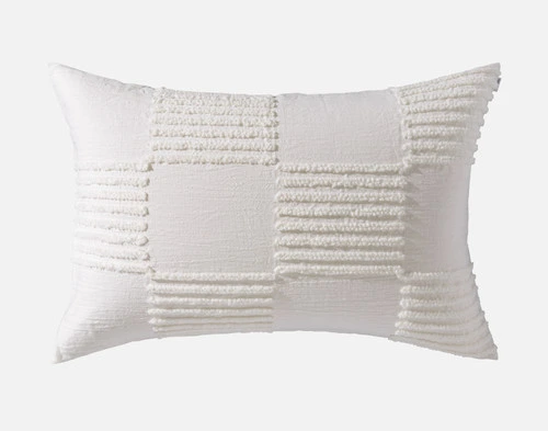 Front view of our Caro Pillow Sham to show its tufted chessboard-style design.