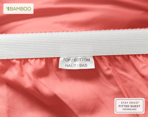 Close up of the Bamboo Cotton Fitted Sheet in Huckleberry Snug Fit elastic for securing the sheet to the bed.