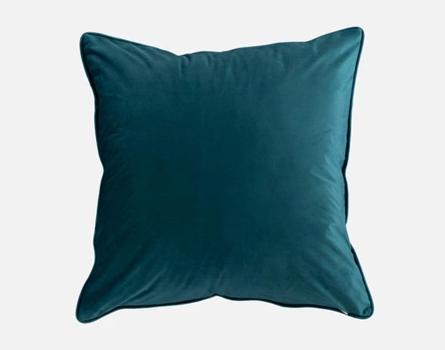 Reverse view of the deep teal backing on our Yolanda Euro Sham sitting on a solid white backdrop.