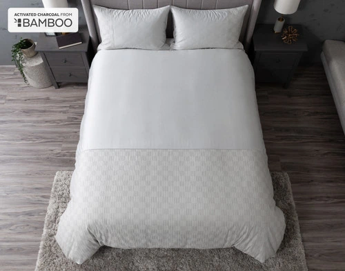 Top view of our Marco Duvet Cover to show its smooth, solid surface and textured checkerboard footer.