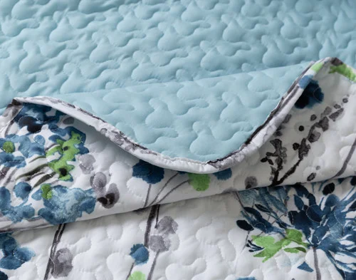 Close-up on the folded corner on our Marisol Coverlet Set.