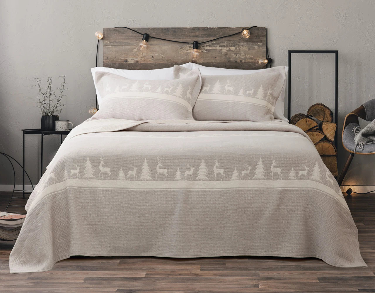 Front view of our Deer Trail Cotton Quilt Set dressing a queen bed in a Canadian bedroom.