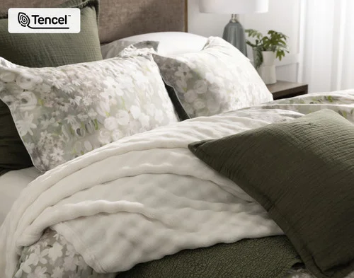 Our Elora Pillow Shams decorating the head of a bed with our Elora collection and accessories.