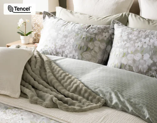 Our Elora Pillow Shams decorating the head of a bed with our Elora collection and accessories.