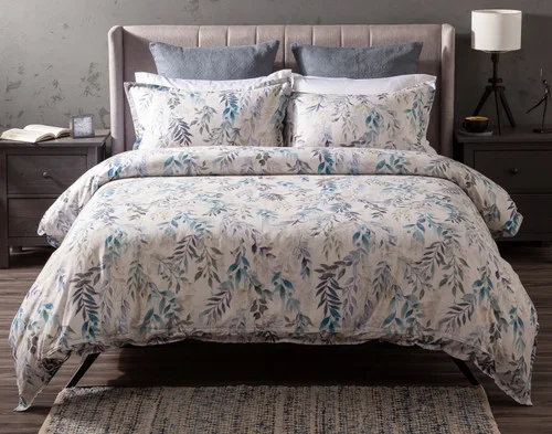 Front view of the reverse side of our Kona Bay Duvet Cover dressing a queen bed in a minimalist room.