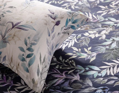 The reverse side of our Kona Bay Pillow Sham atop the main side of our Kona Bay Duvet Cover.