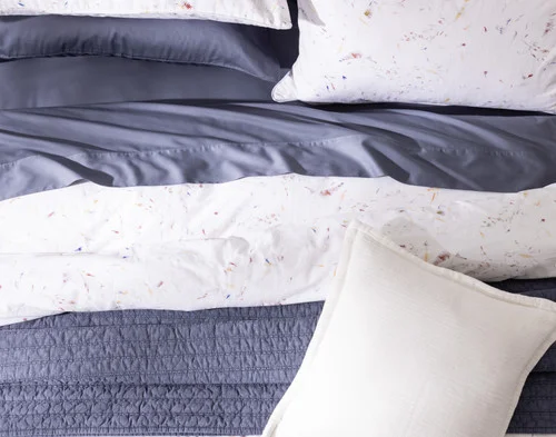 Our Memories Pillow Shams dressing the head of a bed with the Memories Duvet Cover.