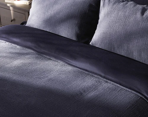 Angled view of the folded edge on our Deep Dive Duvet Cover Set.
