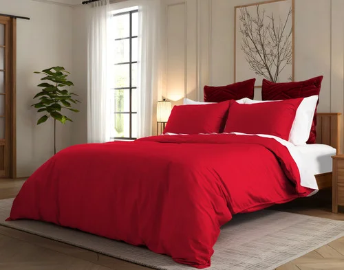 Angled view of our Heartfelt Duvet Cover Set dressing a queen bed in an elegant room.