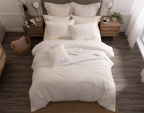 Image from above of our Savary collection dressing a bed in a modern room.