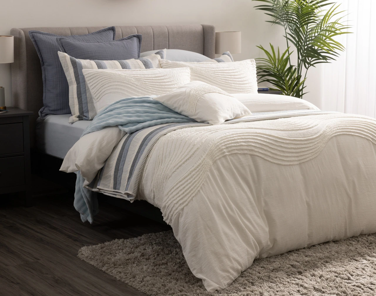 Angled view of our Savary collection dressed with bleu accessories.