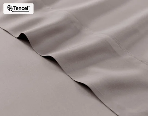 Close-up on the fitted and flat sheet of our BeechBliss TENCEL™ Modal Sheet Set in Beachcomber.