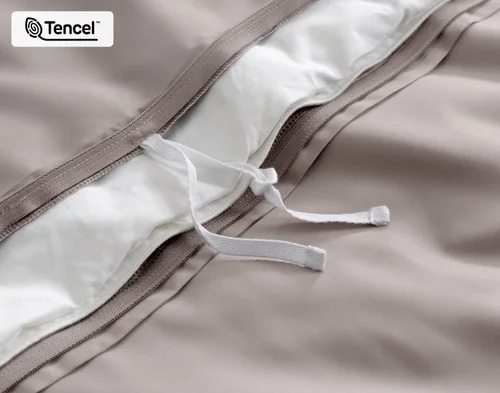 Angled view of a side duvet tie on the inside of our Beachcomber BeechBliss Duvet Cover.