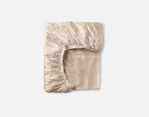 Our Champagne Silk Blend Fitted Sheet folded into a tidy square.