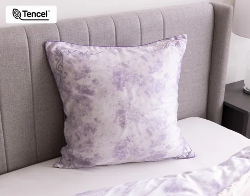 Angled view of our Constance Euro Sham resting on a coordinating bed.