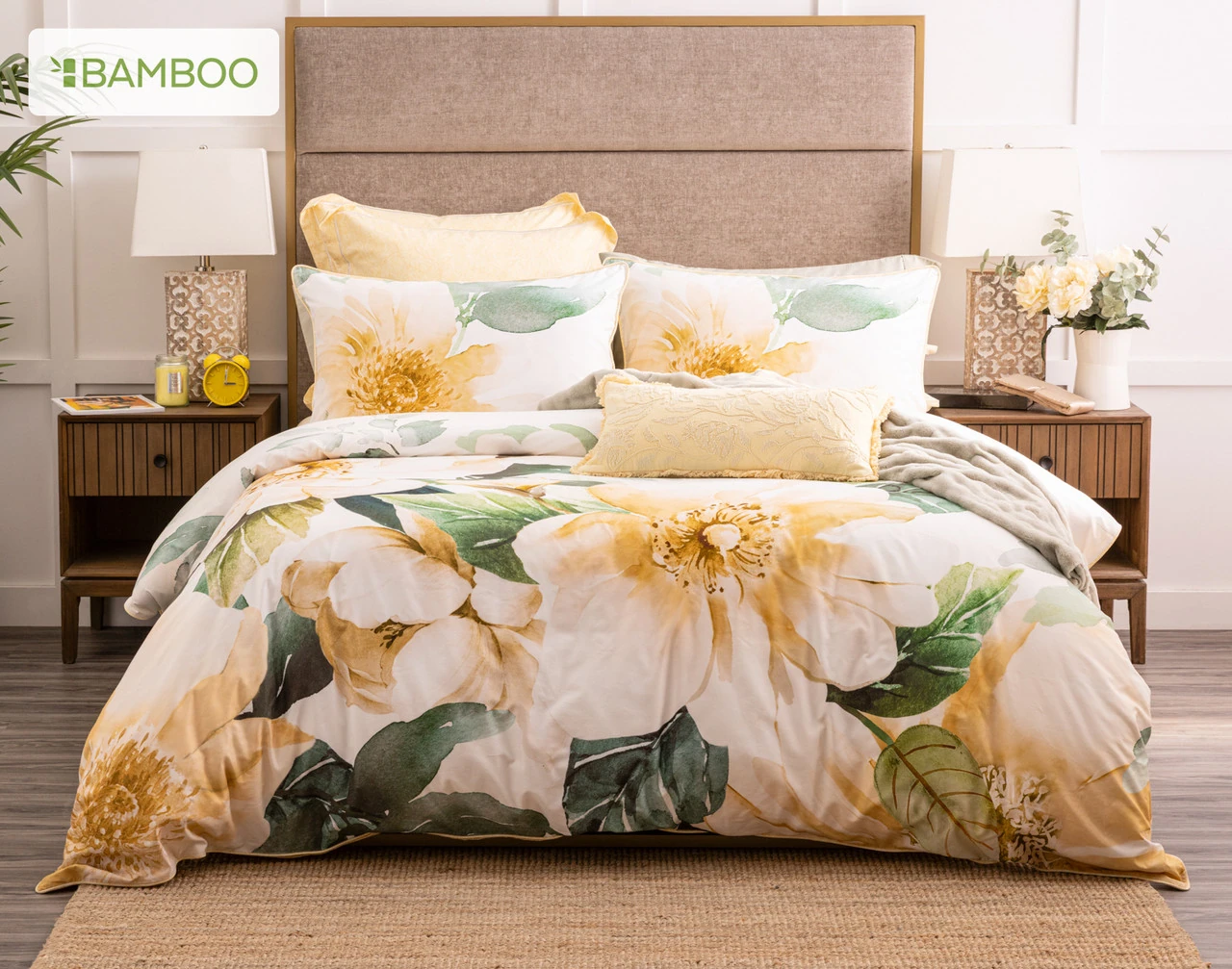 Our Oriana Duvet Cover dressing a queen bed with yellow accessories.
