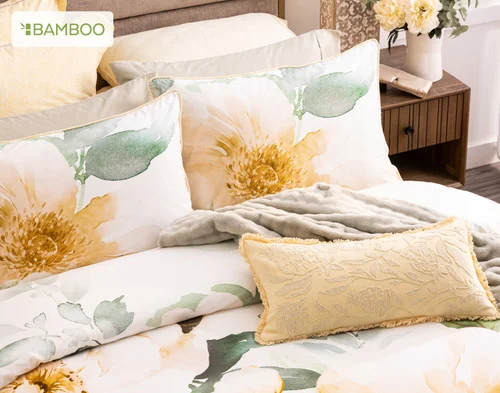 Our Oriana collection dressing a bed with yellow accessories.