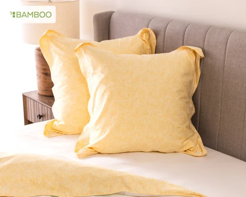 Two of our Oriana Euro Shams at the head of a bed.