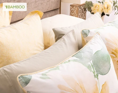 Our Oriana Euro Shams with our Oriana Pillow Shams at the head of a bed.